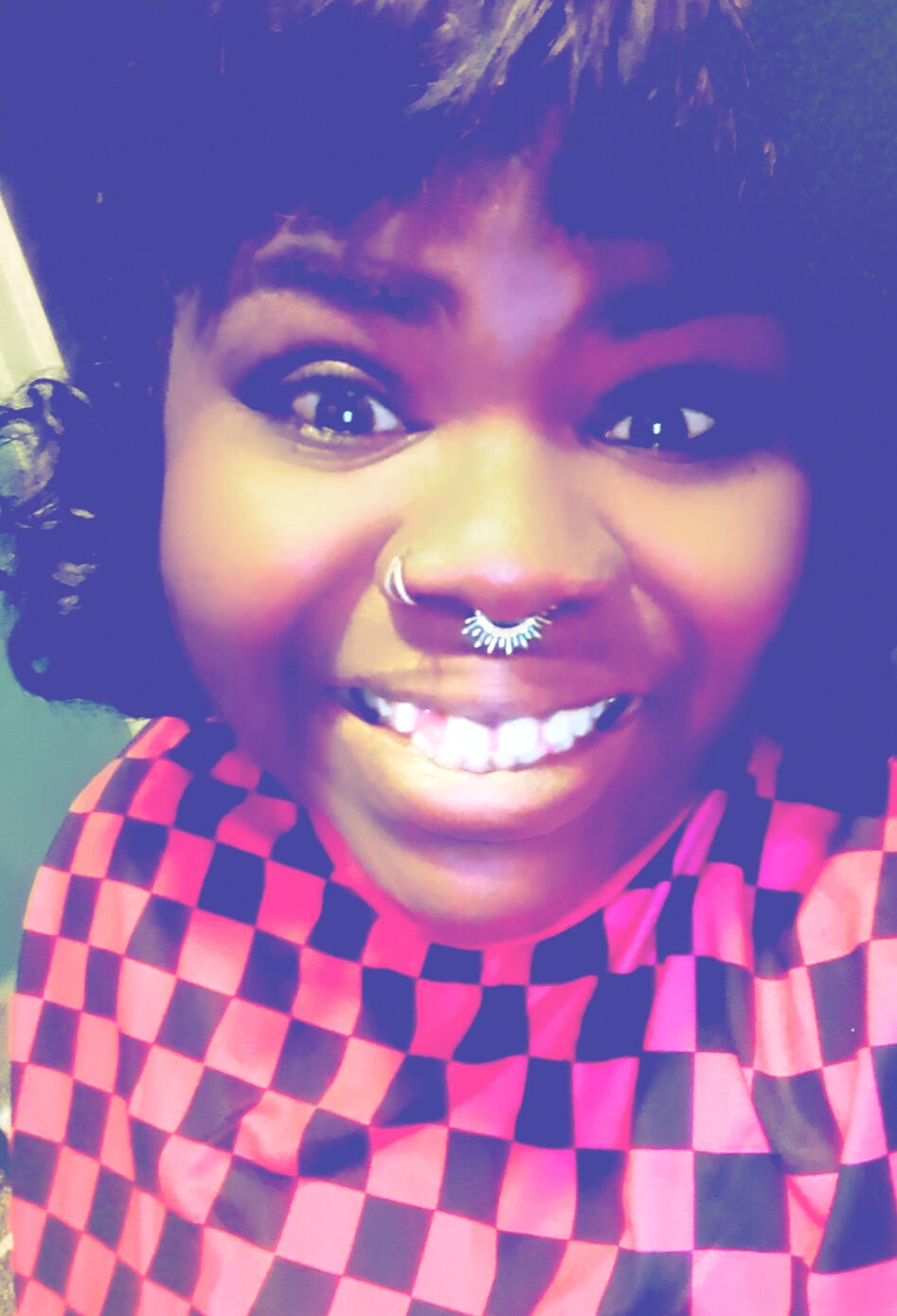 Its me! black girl with pink hair smiles